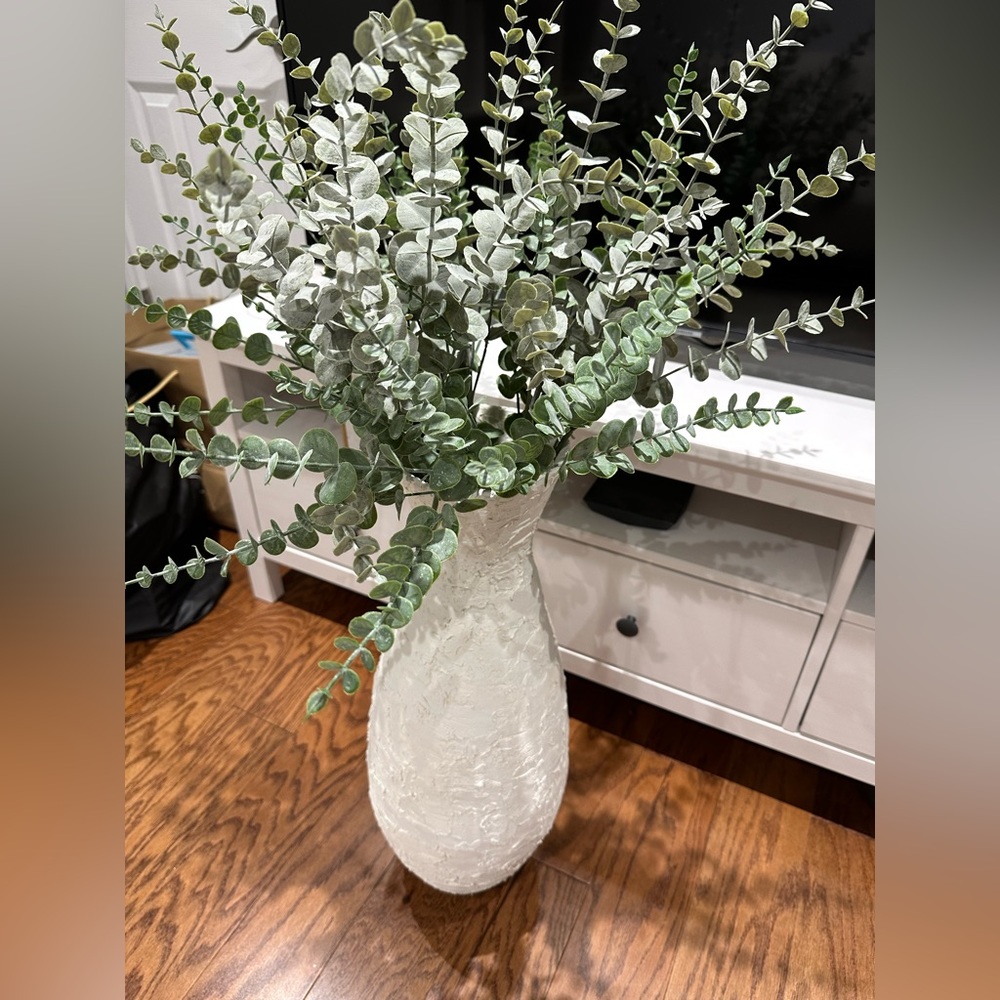 Handmade plaster decorative vase with faux plants